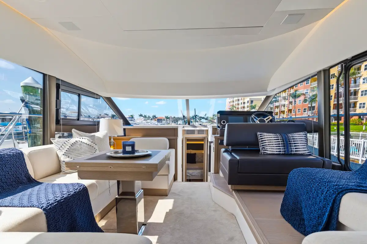 HDR interior photo of a yacht salon with the deck visible through the glass